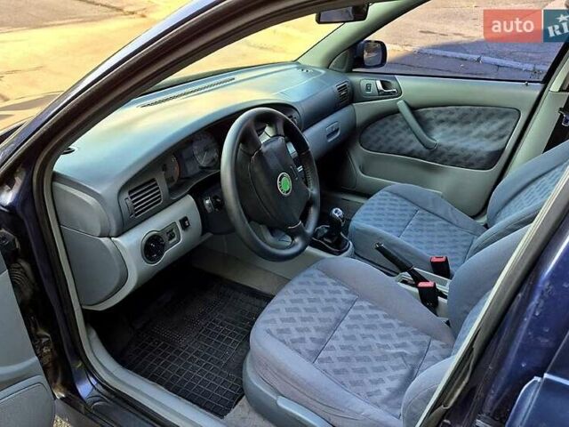 Синий Шкода Октавия, объемом двигателя 1.8 л и пробегом 400 тыс. км за 2300 $, фото 5 на Automoto.ua