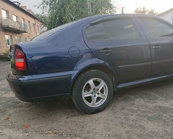 Синий Шкода Октавия, объемом двигателя 1.8 л и пробегом 244 тыс. км за 3300 $, фото 4 на Automoto.ua
