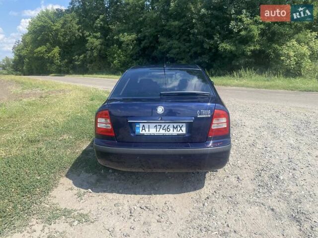 Синий Шкода Октавия, объемом двигателя 1.6 л и пробегом 282 тыс. км за 4700 $, фото 4 на Automoto.ua