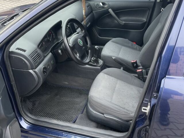 Синий Шкода Октавия, объемом двигателя 1.6 л и пробегом 242 тыс. км за 4800 $, фото 7 на Automoto.ua