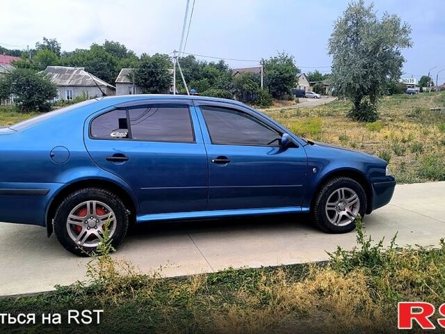 Синий Шкода Октавия, объемом двигателя 1.6 л и пробегом 315 тыс. км за 3800 $, фото 2 на Automoto.ua