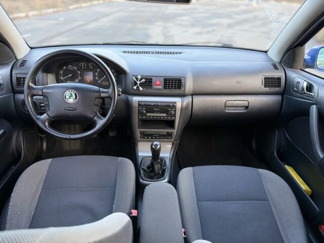 Синий Шкода Октавия, объемом двигателя 1.8 л и пробегом 265 тыс. км за 5600 $, фото 12 на Automoto.ua