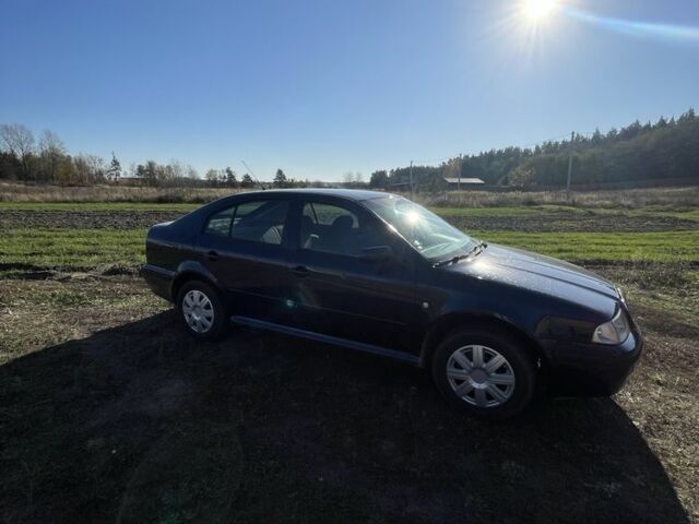 Синий Шкода Октавия, объемом двигателя 1.6 л и пробегом 220 тыс. км за 2200 $, фото 2 на Automoto.ua