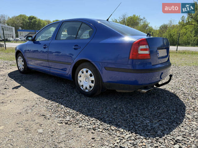 Синий Шкода Октавия, объемом двигателя 1.6 л и пробегом 243 тыс. км за 5800 $, фото 4 на Automoto.ua