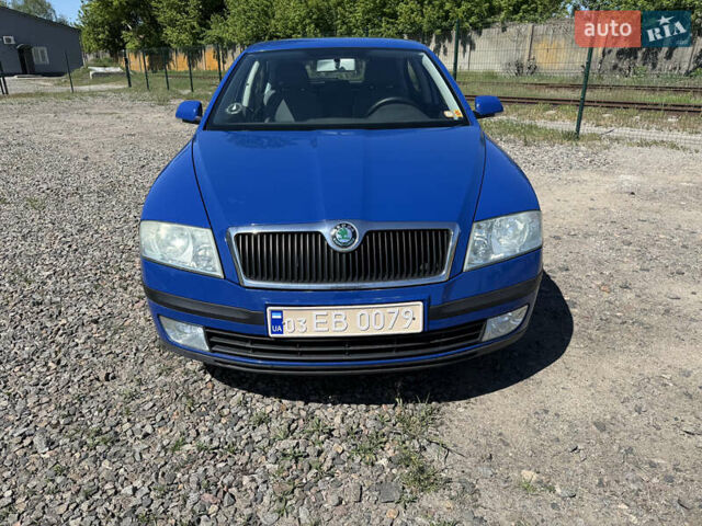 Синий Шкода Октавия, объемом двигателя 1.6 л и пробегом 243 тыс. км за 5800 $, фото 1 на Automoto.ua