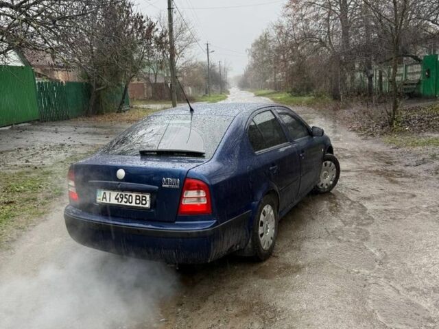 Синий Шкода Октавия, объемом двигателя 1.6 л и пробегом 306 тыс. км за 4200 $, фото 5 на Automoto.ua