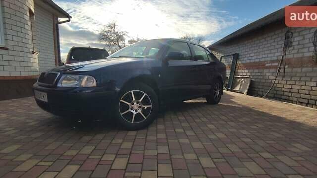 Синий Шкода Октавия, объемом двигателя 1.6 л и пробегом 313 тыс. км за 4900 $, фото 21 на Automoto.ua