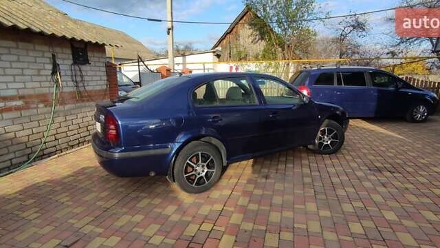 Синий Шкода Октавия, объемом двигателя 1.6 л и пробегом 313 тыс. км за 4900 $, фото 8 на Automoto.ua