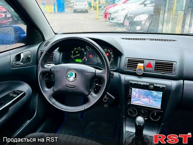 Синий Шкода Октавия, объемом двигателя 1.6 л и пробегом 250 тыс. км за 5699 $, фото 7 на Automoto.ua