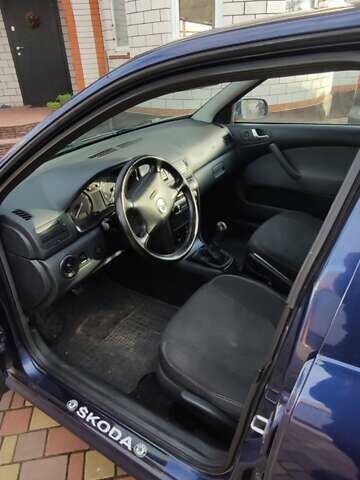 Синий Шкода Октавия, объемом двигателя 1.6 л и пробегом 313 тыс. км за 4900 $, фото 20 на Automoto.ua