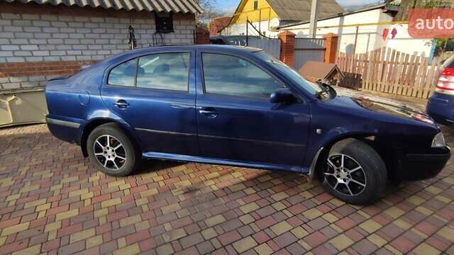 Синий Шкода Октавия, объемом двигателя 1.6 л и пробегом 313 тыс. км за 4900 $, фото 2 на Automoto.ua