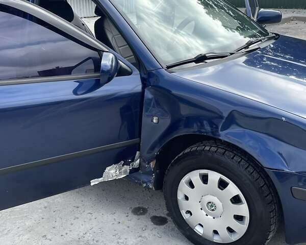 Синий Шкода Октавия, объемом двигателя 1.6 л и пробегом 265 тыс. км за 5500 $, фото 16 на Automoto.ua