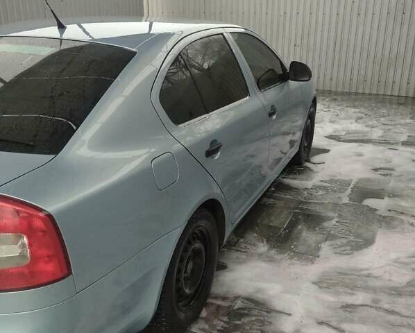 Синий Шкода Октавия, объемом двигателя 1.2 л и пробегом 242 тыс. км за 5600 $, фото 2 на Automoto.ua