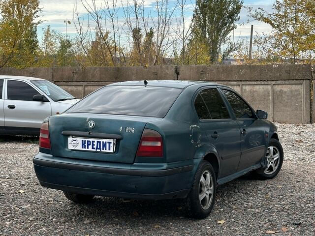 Зеленый Шкода Октавия, объемом двигателя 1.8 л и пробегом 294 тыс. км за 2400 $, фото 1 на Automoto.ua