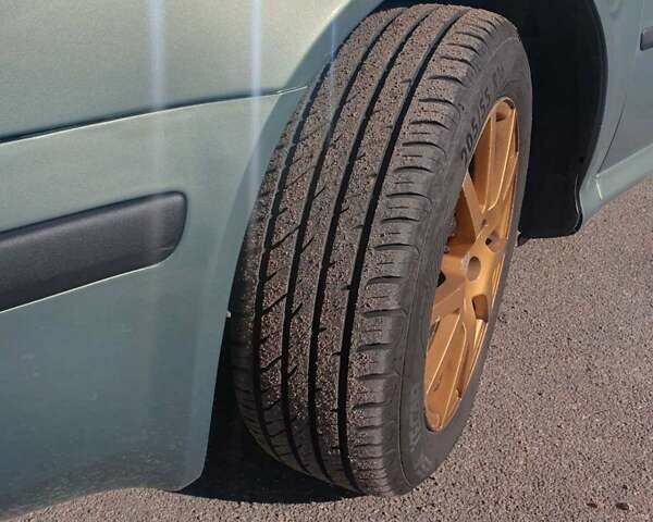 Зелений Шкода Октавія, об'ємом двигуна 1.78 л та пробігом 385 тис. км за 5100 $, фото 9 на Automoto.ua