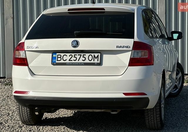 Белый Шкода Рапид, объемом двигателя 1.6 л и пробегом 340 тыс. км за 8998 $, фото 26 на Automoto.ua