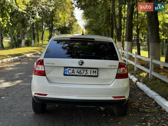 Белый Шкода Рапид, объемом двигателя 1.4 л и пробегом 230 тыс. км за 5800 $, фото 3 на Automoto.ua