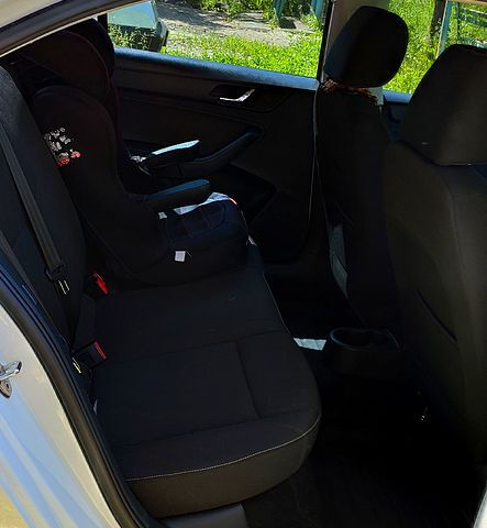 Белый Шкода Рапид, объемом двигателя 1.2 л и пробегом 135 тыс. км за 8800 $, фото 2 на Automoto.ua