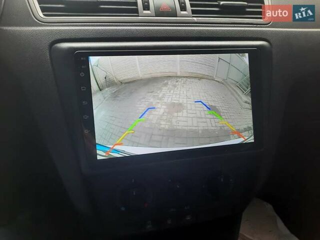 Белый Шкода Рапид, объемом двигателя 1.2 л и пробегом 291 тыс. км за 7000 $, фото 11 на Automoto.ua