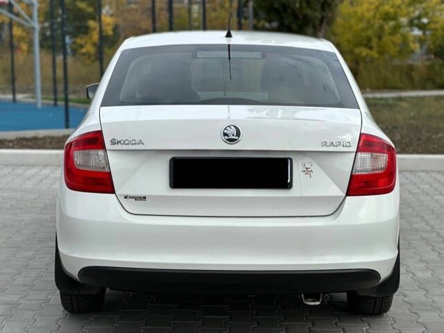 Шкода Рапид 2014 в Кропивницком (Кировограде) на Automoto.ua Белый Шкода Рапид, объемом двигателя 1.2 л и пробегом 180 тыс. км за 7499 $, фото 7 на Automoto.ua