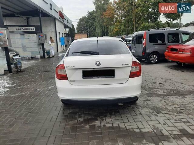 Белый Шкода Рапид, объемом двигателя 1.2 л и пробегом 291 тыс. км за 7000 $, фото 5 на Automoto.ua