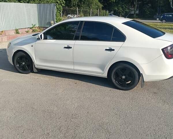 Білий Шкода Рапід, об'ємом двигуна 1.2 л та пробігом 265 тис. км за 6700 $, фото 1 на Automoto.ua