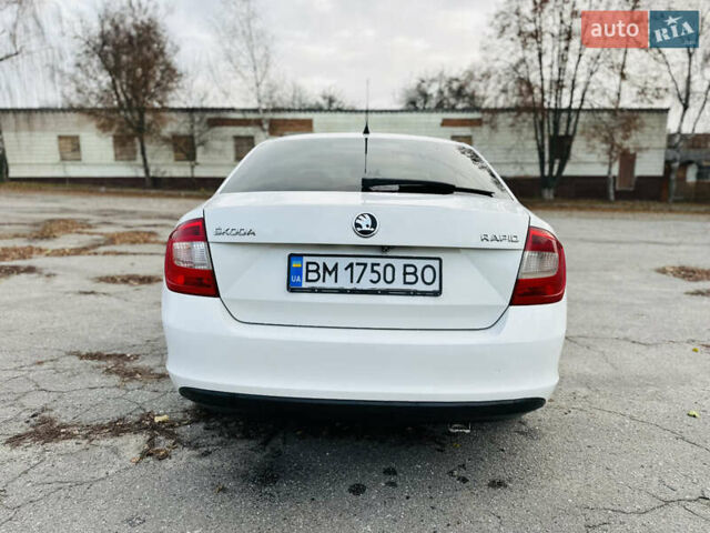 Белый Шкода Рапид, объемом двигателя 1.2 л и пробегом 65 тыс. км за 9300 $, фото 2 на Automoto.ua