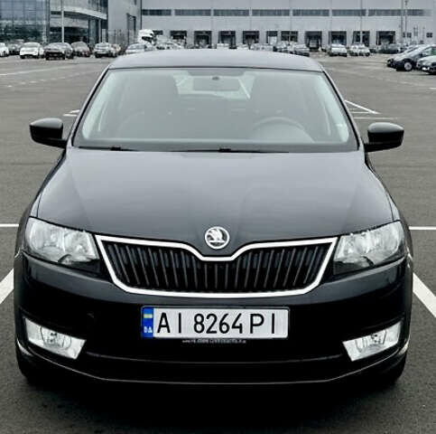 Черный Шкода Рапид, объемом двигателя 1.4 л и пробегом 214 тыс. км за 10600 $, фото 1 на Automoto.ua