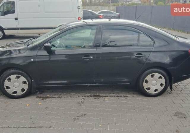 Черный Шкода Рапид, объемом двигателя 1.6 л и пробегом 360 тыс. км за 7500 $, фото 2 на Automoto.ua