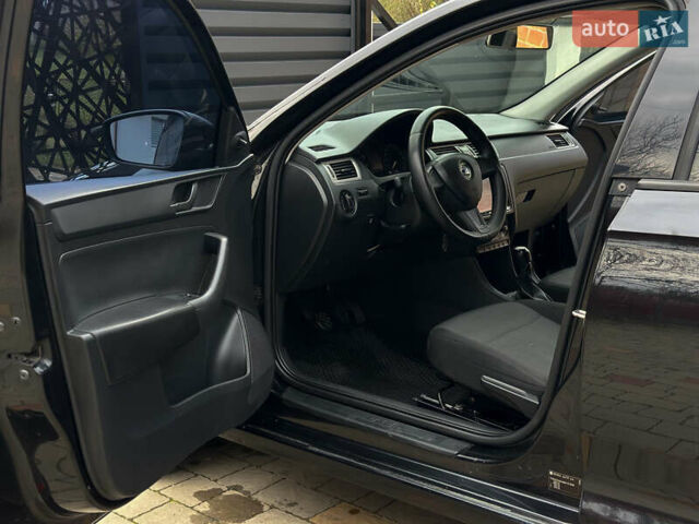 Шкода Рапід 2013 у Самборе на Automoto.ua Чорний Шкода Рапід, об'ємом двигуна 1.6 л та пробігом 279 тис. км за 5990 $, фото 27 на Automoto.ua