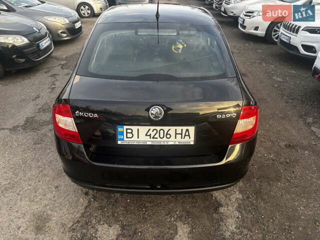 Чорний Шкода Рапід, об'ємом двигуна 1.6 л та пробігом 261 тис. км за 8000 $, фото 7 на Automoto.ua