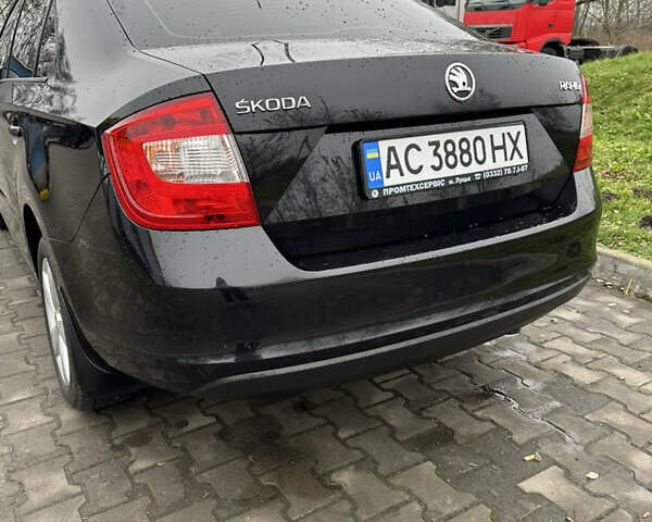 Черный Шкода Рапид, объемом двигателя 1.2 л и пробегом 175 тыс. км за 8000 $, фото 1 на Automoto.ua