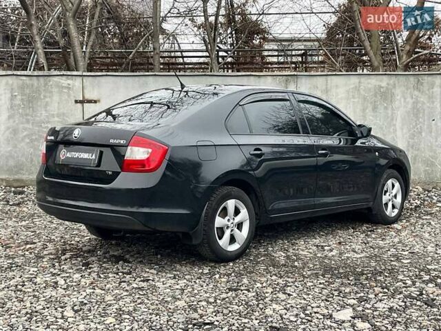 Черный Шкода Рапид, объемом двигателя 1.2 л и пробегом 197 тыс. км за 7690 $, фото 9 на Automoto.ua
