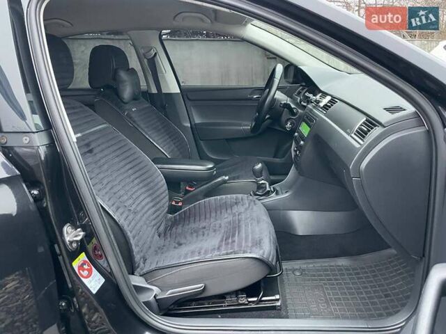 Черный Шкода Рапид, объемом двигателя 1.2 л и пробегом 197 тыс. км за 7690 $, фото 14 на Automoto.ua