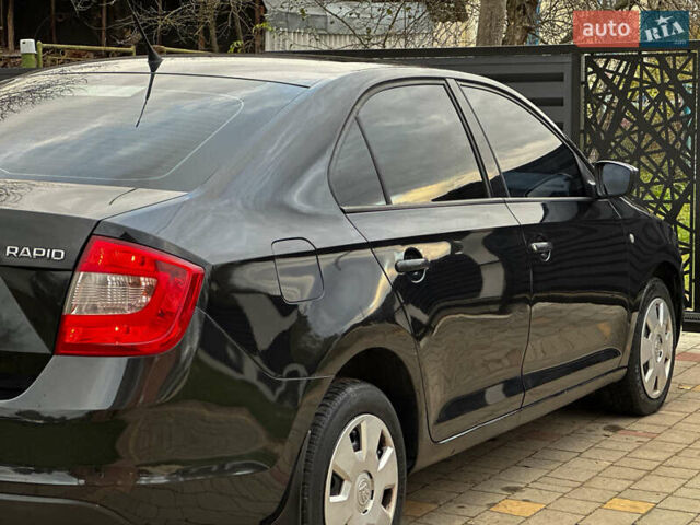 Шкода Рапід 2013 у Самборе на Automoto.ua Чорний Шкода Рапід, об'ємом двигуна 1.6 л та пробігом 279 тис. км за 5990 $, фото 14 на Automoto.ua