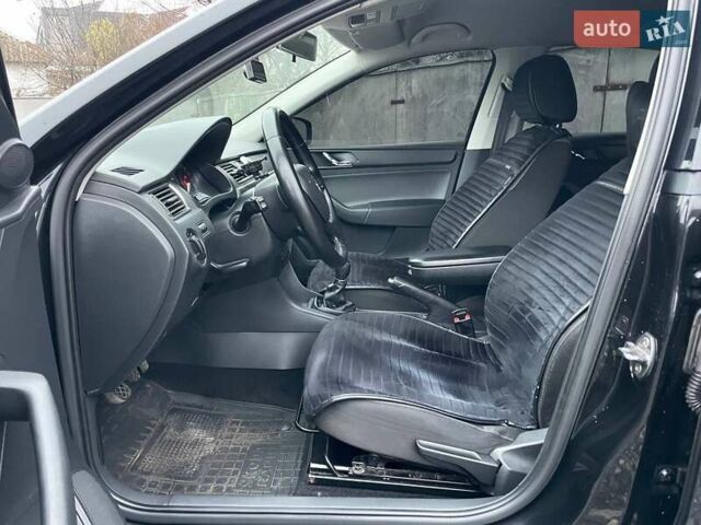 Черный Шкода Рапид, объемом двигателя 1.2 л и пробегом 197 тыс. км за 7690 $, фото 11 на Automoto.ua