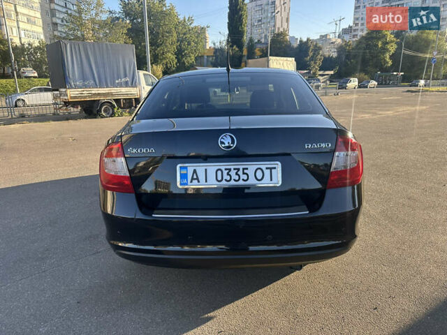Шкода Рапид 2015 в Киеве на Automoto.ua Черный Шкода Рапид, объемом двигателя 1.2 л и пробегом 231 тыс. км за 7499 $, фото 5 на Automoto.ua