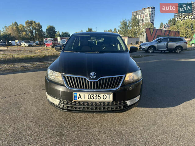 Шкода Рапид 2015 в Киеве на Automoto.ua Черный Шкода Рапид, объемом двигателя 1.2 л и пробегом 231 тыс. км за 7499 $, фото 1 на Automoto.ua