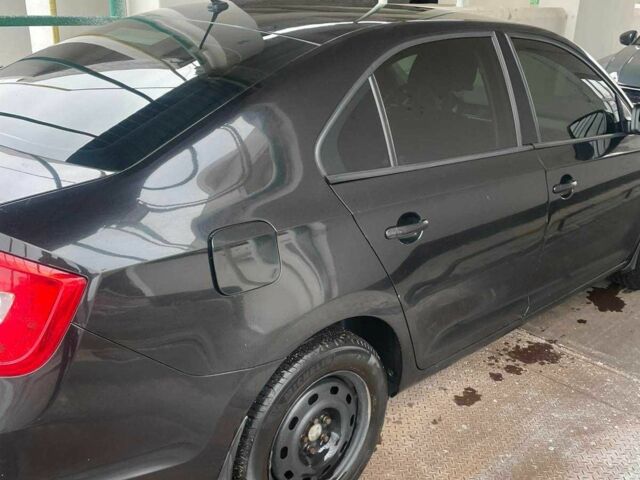 Черный Шкода Рапид, объемом двигателя 1.2 л и пробегом 220 тыс. км за 6291 $, фото 1 на Automoto.ua