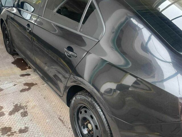 Черный Шкода Рапид, объемом двигателя 1.2 л и пробегом 220 тыс. км за 6291 $, фото 2 на Automoto.ua