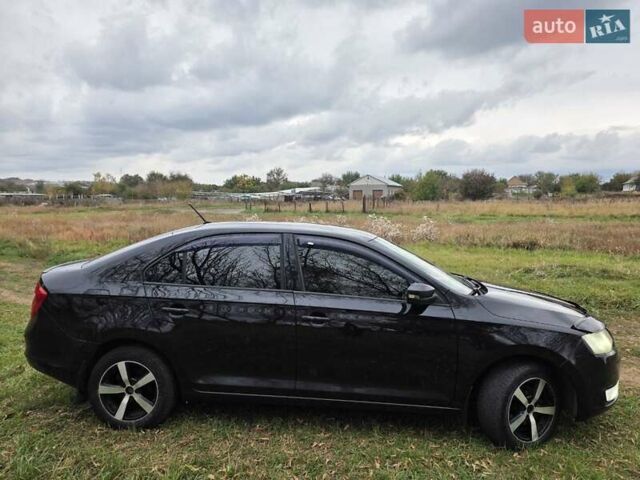 Черный Шкода Рапид, объемом двигателя 1.2 л и пробегом 350 тыс. км за 9000 $, фото 1 на Automoto.ua