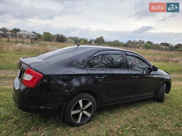 Черный Шкода Рапид, объемом двигателя 1.2 л и пробегом 350 тыс. км за 9000 $, фото 4 на Automoto.ua