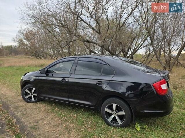 Черный Шкода Рапид, объемом двигателя 1.2 л и пробегом 350 тыс. км за 9000 $, фото 8 на Automoto.ua