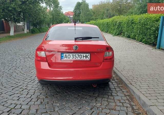 Шкода Рапид 2013 в Мукачеве на Automoto.ua Красный Шкода Рапид, объемом двигателя 1.2 л и пробегом 190 тыс. км за 6800 $, фото 1 на Automoto.ua