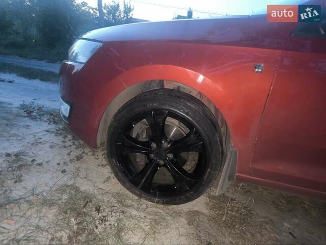 Червоний Шкода Рапід, об'ємом двигуна 1.2 л та пробігом 76 тис. км за 9000 $, фото 14 на Automoto.ua