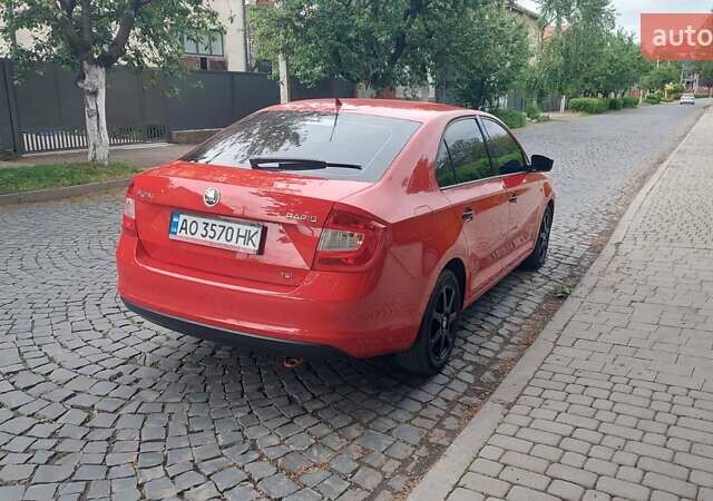 Шкода Рапид 2013 в Мукачеве на Automoto.ua Красный Шкода Рапид, объемом двигателя 1.2 л и пробегом 190 тыс. км за 6800 $, фото 5 на Automoto.ua