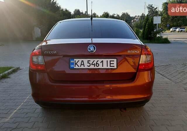 Шкода Рапид 2013 в Броварах на Automoto.ua Красный Шкода Рапид, объемом двигателя 1.6 л и пробегом 189 тыс. км за 8200 $, фото 4 на Automoto.ua