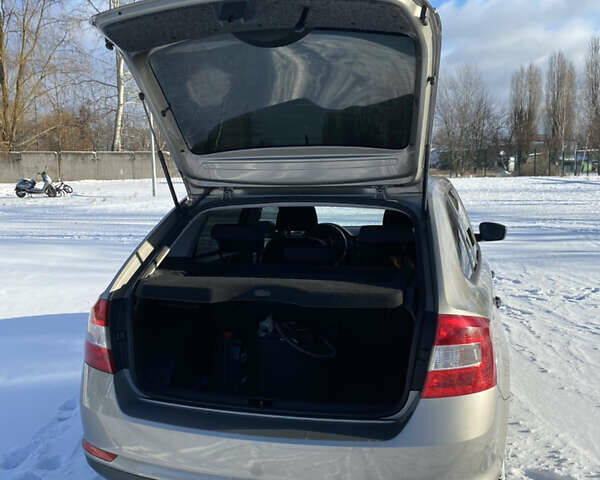 Серый Шкода Рапид, объемом двигателя 1.2 л и пробегом 120 тыс. км за 7300 $, фото 3 на Automoto.ua