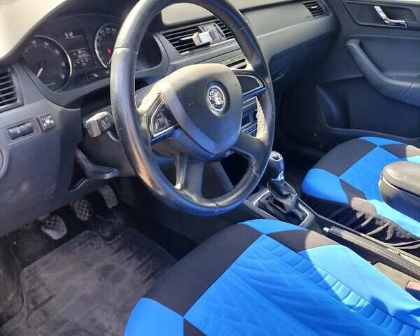Синий Шкода Рапид, объемом двигателя 1.2 л и пробегом 168 тыс. км за 6799 $, фото 9 на Automoto.ua