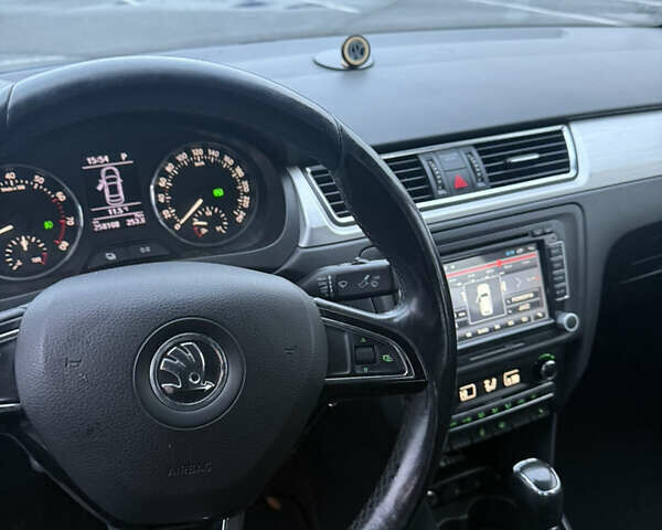Синий Шкода Рапид, объемом двигателя 1.6 л и пробегом 258 тыс. км за 7850 $, фото 4 на Automoto.ua